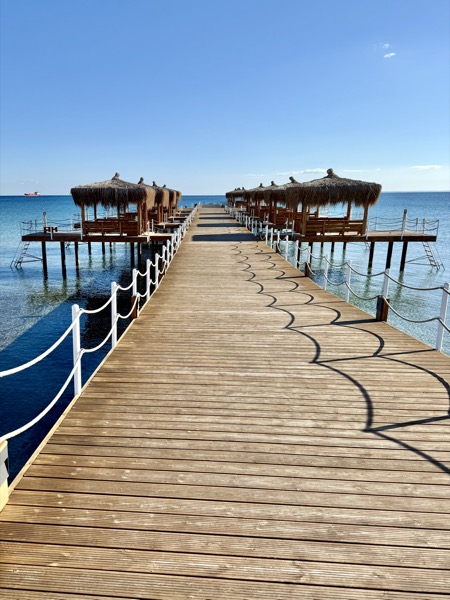 Beach pier with cabanas