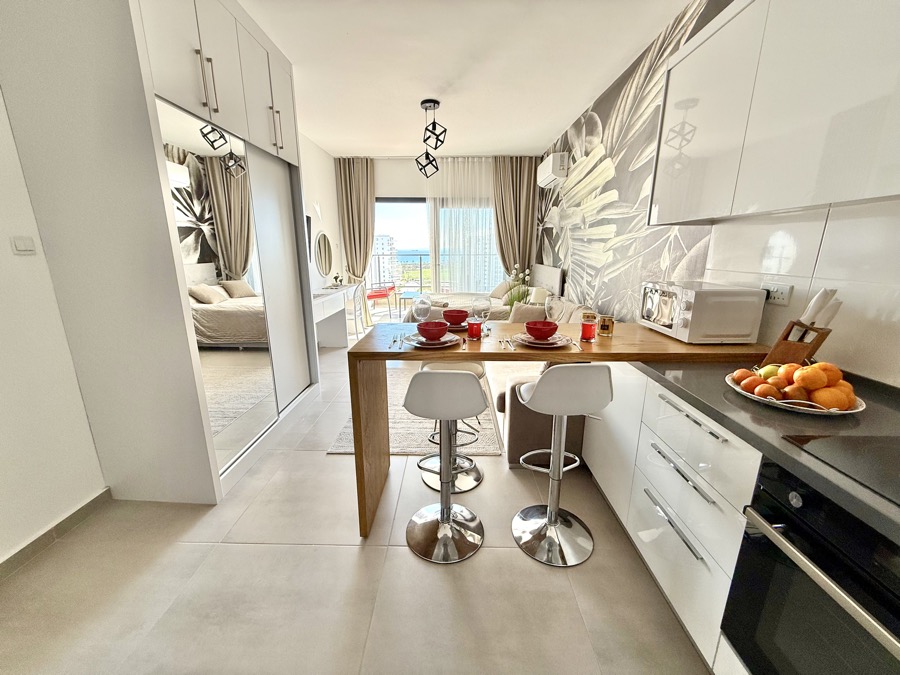 Kitchen and living area with sea view